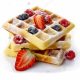 stock-photo-belgium-waffles-with-fresh-berries-and-caster-sugar-isolated-on-white-background-176306876